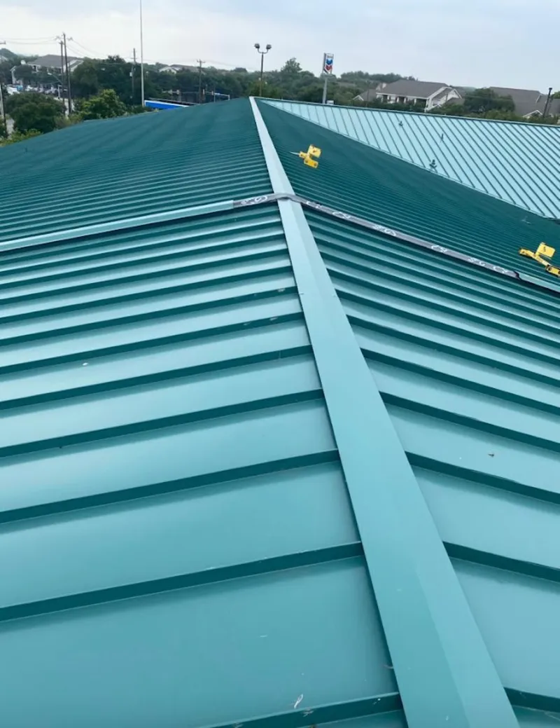 Green commercial metal roof ridge and valley for Metal Roof Repair in Beloit