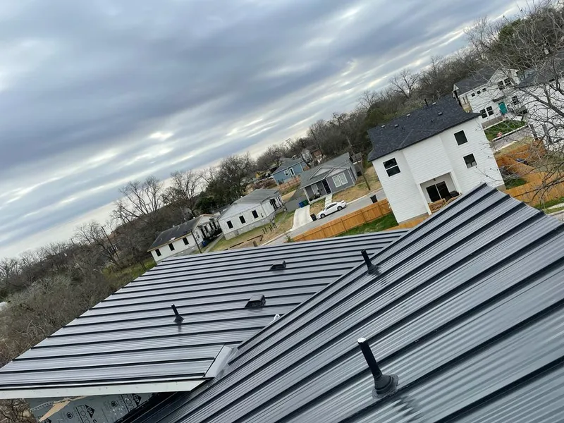 Standing seam metal roof panels with vents for Skylight Repair in Beloit